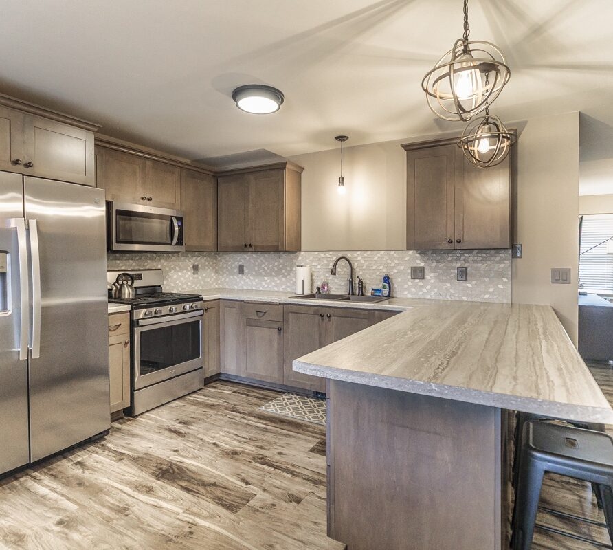 Welcome to your modern retreat on 14th Street, just steps from Lambeau Field. This stylish, fully equipped home offers comfort, convenience, and the perfect location for game days, family stays, or weekend getaways in Green Bay.