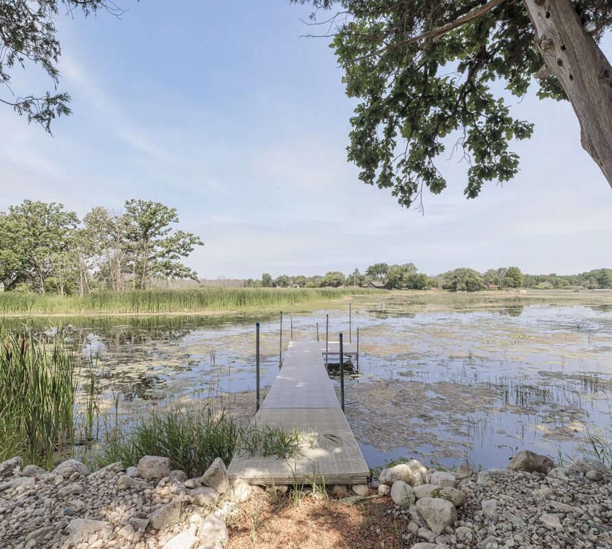 Dock extending into the bay, ideal for fishing or kayaking