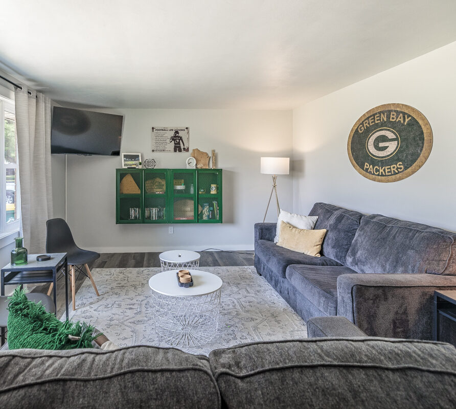 Explore the cozy charm, spacious layout, and unbeatable location of our Green Bay getaway—just steps from Lambeau Field.